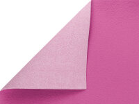 Ein pinkfarbenes Blatt Papier liegt auf einer ebenen Oberfläche, die obere rechte Ecke ist nach unten umgeknickt.